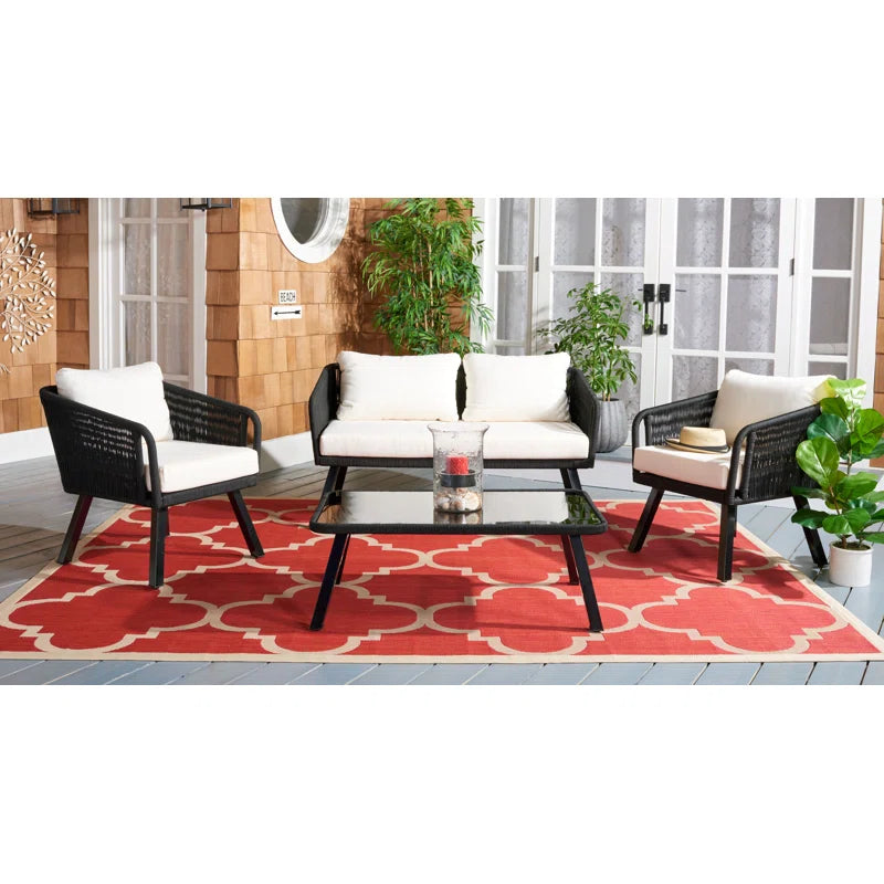 Canelo 4 Piece Rattan Sofa Seating Group with Cushions