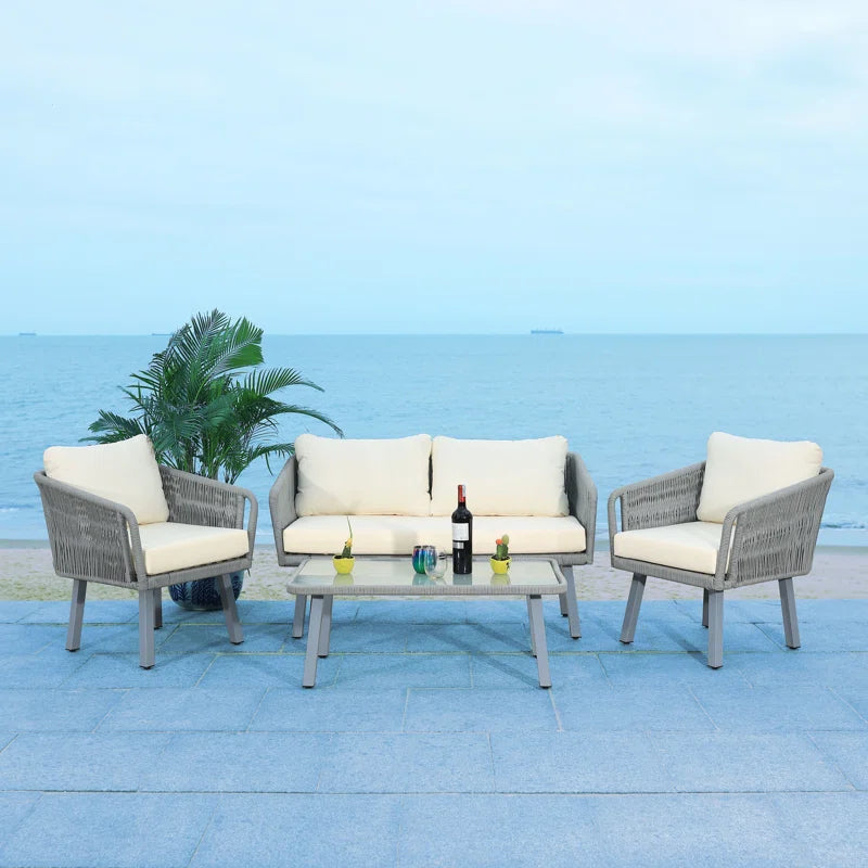 Canelo 4 Piece Rattan Sofa Seating Group with Cushions